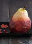 Poached pear in pomegranate juice